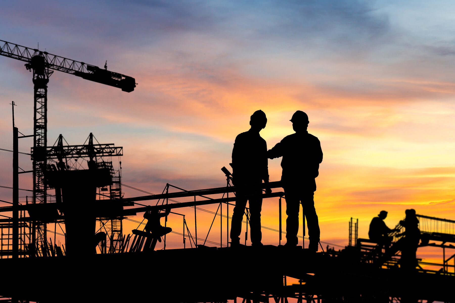 EOCT engineers silhouetted at sunset